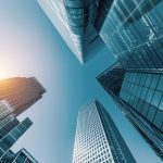 skyscrapers in a finance district from a low angle